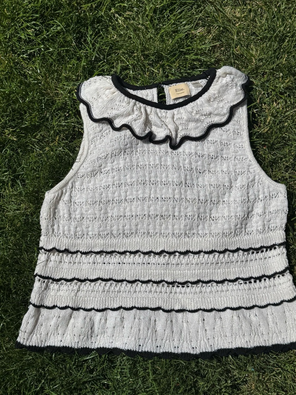 Tahari Cream Knit Sleeveless Top with Black Trim 76% cotton 24% polyamide.